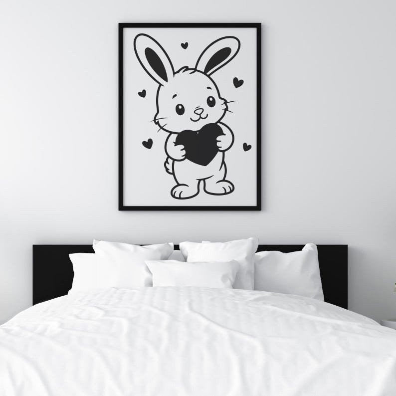 K&ouml;nnte beinhalten: Schwarz gerahmter Druck mit einem Cartoon-Hasen, der ein schwarzes Herz h&auml;lt. Der Hase ist wei&szlig; mit schwarzen Umrissen und Details. Kleine schwarze Herzen sind um den Hasen verstreut.