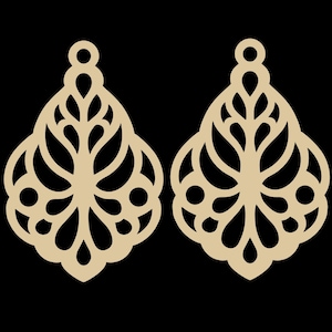 May include: Two beige, laser-cut earrings with an intricate floral design. Each earring features a teardrop shape with a circular top for the ear wire. The design includes curved lines and circular accents, set against a black background.