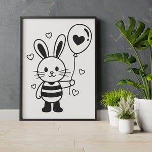 K&ouml;nnte beinhalten: Schwarz-wei&szlig; gerahmter Kunstdruck mit einem Cartoon-Hasen, der einen herzf&ouml;rmigen Ballon h&auml;lt. Der Hase tr&auml;gt gestreifte Kleidung und ist von Herzformen umgeben. Das Kunstwerk wird auf wei&szlig;em Hintergrund pr&auml;sentiert.