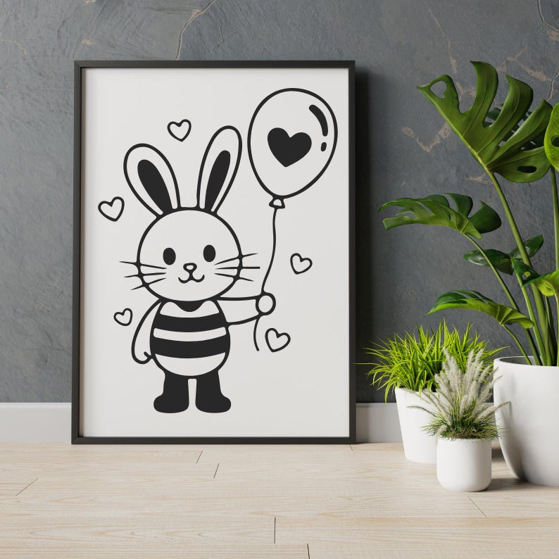 K&ouml;nnte beinhalten: Schwarz-wei&szlig; gerahmter Kunstdruck mit einem Cartoon-Hasen, der einen herzf&ouml;rmigen Ballon h&auml;lt. Der Hase tr&auml;gt gestreifte Kleidung und ist von Herzformen umgeben. Das Kunstwerk wird auf wei&szlig;em Hintergrund pr&auml;sentiert.