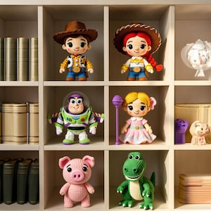May include: A collection of handmade crochet dolls, including a cowboy, cowgirl, space ranger, and other characters. The dolls are displayed on a white shelf with a neutral background. Each doll has detailed features and vibrant colors.