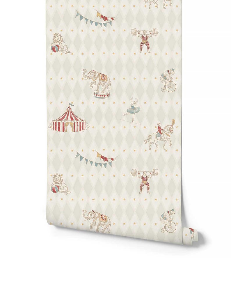 May include: Wallpaper roll with a circus theme. The design features repeating illustrations of circus animals and performers, including elephants, lions, a strongman, a ballerina, and a bear on a bicycle, set against a diamond pattern background.