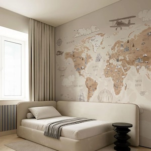 May include: A beige bed with a white mattress and a gray blanket. The wall behind the bed features a world map mural in brown and beige tones, with illustrations of airplanes and landmarks. A black side table is next to the bed.