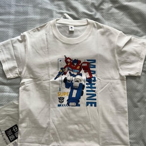 Camiseta infantil con estampado de flores, novedad de verano de 2025, camisetas coreanas para niños, camisetas versátiles de media manga con sensación de hielo, ropa de dibujos animados para bebés.