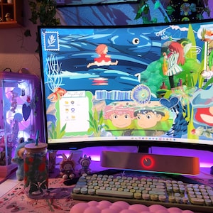 May include: A computer setup with a curved monitor displaying a colorful animated scene. A keyboard, mouse, and speaker are in front of the monitor. A desktop computer case with internal components is visible to the left. The setup is illuminated with pink and purple lighting.