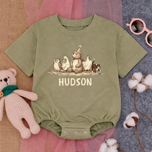 May include: A white ceramic mug with a black handle and the text "But First, Coffee" in a black, bold font. The mug is on a white surface. The mug is approximately 4 inches tall.