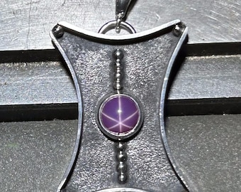 Burgandy Linde Star Sapphire in a Sterling Shadow Box necklace.