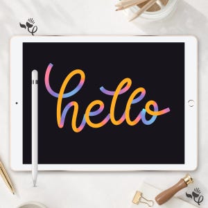 May include: A white tablet with a black screen displaying the word hello in a cursive, gradient-coloured font that transitions from orange to purple and blue. A white stylus is positioned vertically on the left side of the tablet screen.