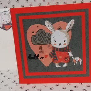 carte animaux dans les tons rouge et gris, lapin, dessin animé