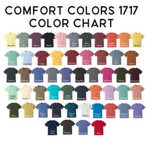 Peut inclure: Un nuancier de couleurs affichant une vari&eacute;t&eacute; de couleurs de t-shirts. Le texte "COMFORT COLORS 1717 COLOR CHART" est en haut. Les couleurs incluent Banana, Black, Blue Jean, Crimson et Red. Chaque couleur est affich&eacute;e sur un t-shirt.