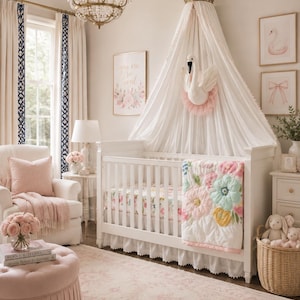 May include: A white wooden crib with a floral quilt, topped by a white fabric canopy featuring a gold crown and a plush swan wall mount. The nursery includes a pink tufted ottoman, a white armchair with a pink pillow, and a wicker basket with plush toys.