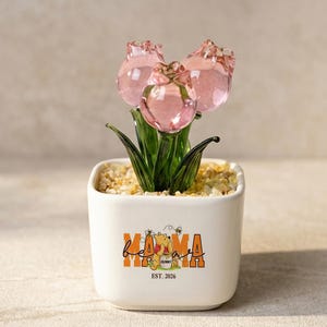 May include: A rustic wooden sign with the text "Welcome to our home" in white lettering. The sign features a distressed finish and a simple, inviting design, perfect for entryway decor.