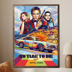 May include: A framed pop art style poster for the film "No Time to Die" featuring Daniel Craig as James Bond, a colorful car, and the film's title. The poster has a wooden frame and is displayed indoors.