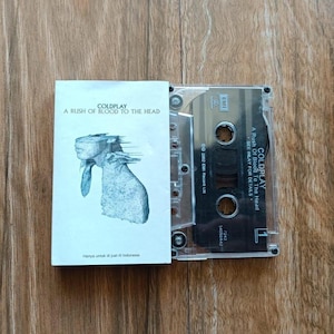 COLDPLAY, une vague de sang dans la tête, sortie d&#39;une cassette en indonésie