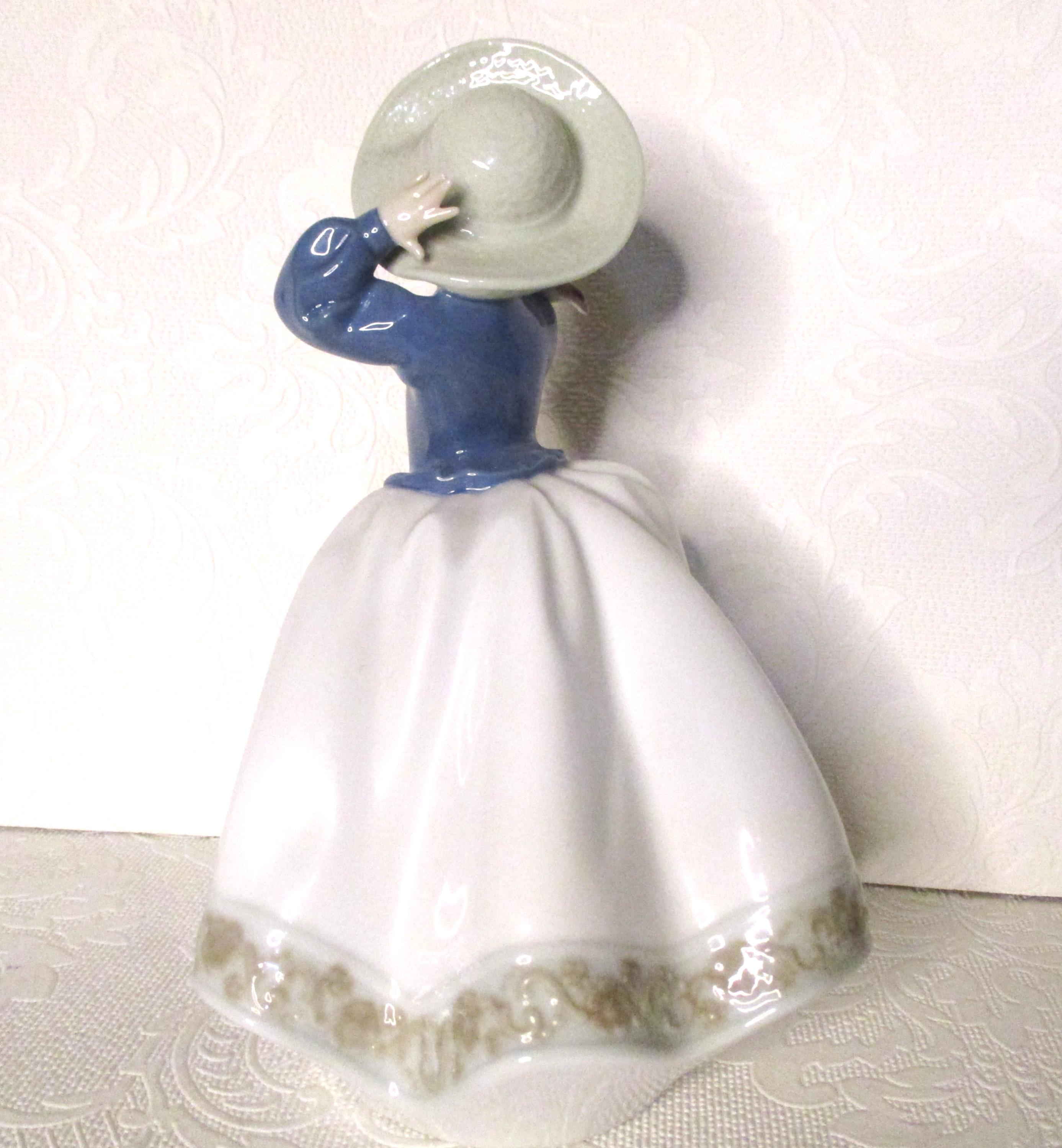 Vintage Daisa 1990 Lladro NAO Girl Wearing A Hat With A Bird on