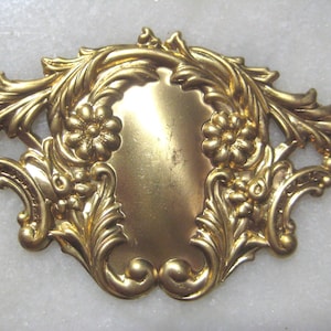 Vintage Floral Medallion: Filigree Leaf & Flower Design, Unplated Brass Stamping, Jewelry Finding Component, Embellishment, 51x35mm, 1 pc.