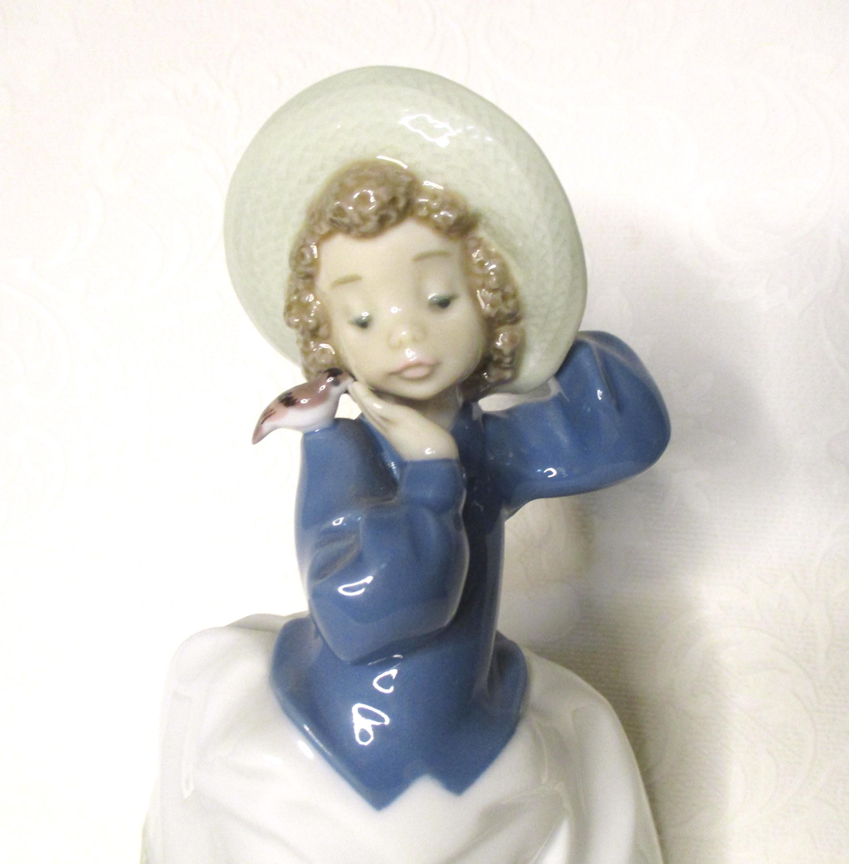 Vintage Daisa 1990 Lladro NAO Girl Wearing A Hat With A Bird on