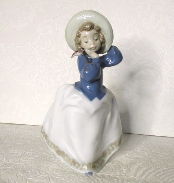 Vintage Daisa 1990 Lladro NAO Girl Wearing A Hat With A Bird on