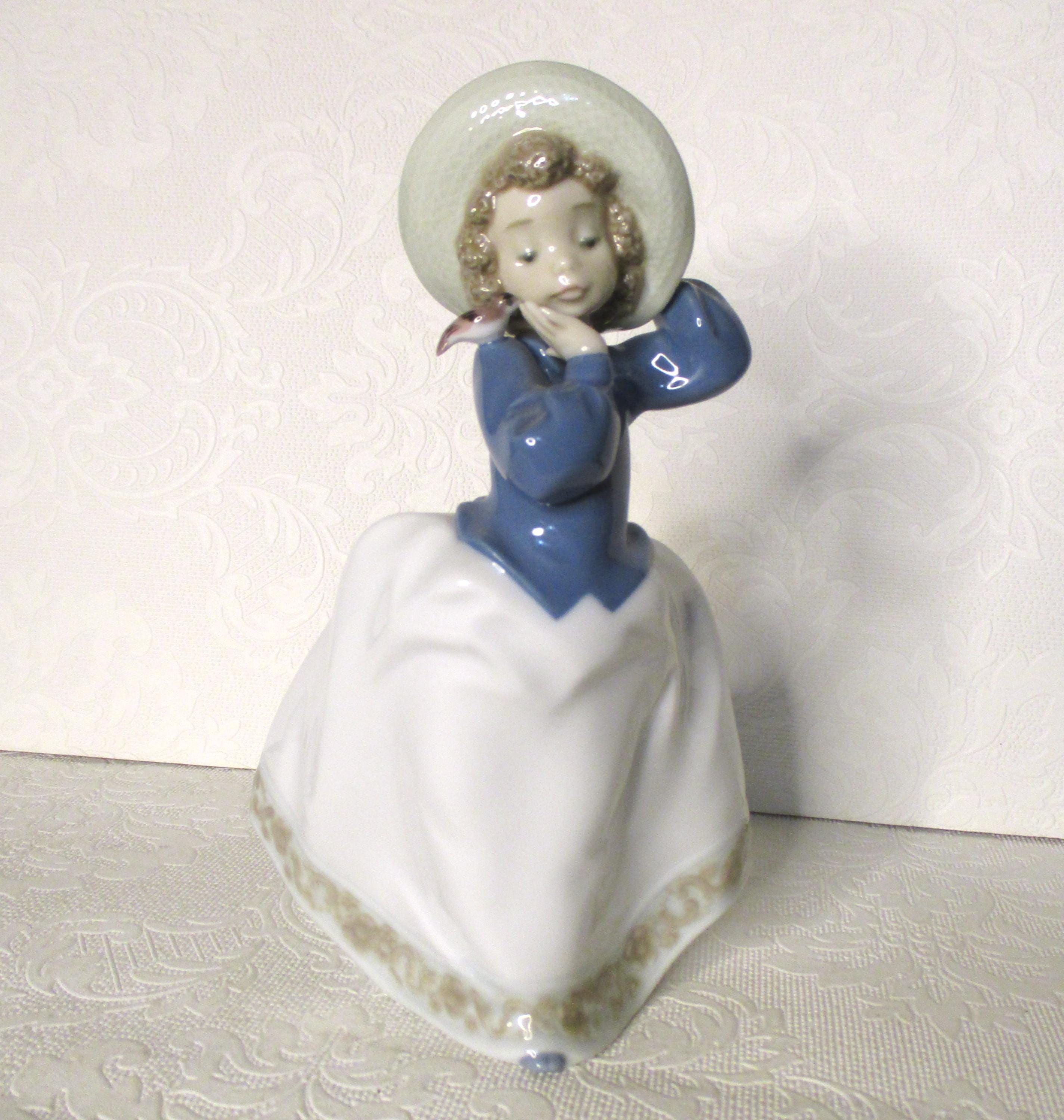 Vintage Daisa 1990 Lladro NAO Girl Wearing A Hat With A Bird on