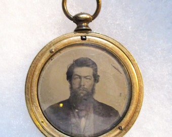 Original Antique Circa 1860's Tintype Photograph Pendant of a Gentleman with a Beard. 1 7/8" Wide (CRMI)