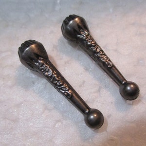 May include: A rustic wooden sign with the text "Welcome to our home" in white lettering. The sign features a distressed finish and a simple, inviting design, perfect for a front porch or entryway.