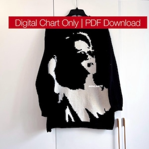 May include: Black and white knit sweater featuring a graphic portrait design. The sweater is hanging on a black hanger against a white background. The text "Digital Chart Only | PDF Download" is displayed in a red banner.