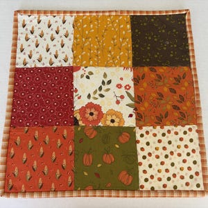 Fall Quilted Table Topper: Reversible, Pumpkins, Flowers, Quilted Candle Mat, 14" Square