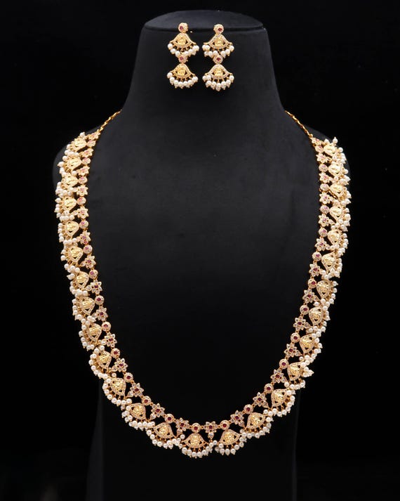 Lakshmi Temple Jewelry in Ruby Crystal 22K Gold Plated Guttapusalu  Necklace Set