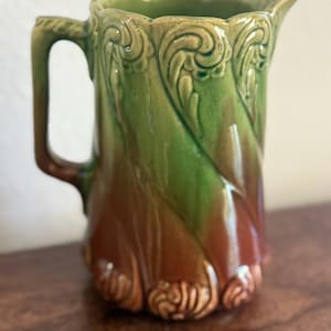 Majolica Style Vintage Art Pottery Pitcher – Green & Brown Leaf Scroll Motif, Embossed Design | Chipped