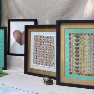 multiple frames by Kalavruti placed alongside to show the variety and the artistic depth of Kalavruti frames. Multiple frames for the same room which will increase the vibe of the room