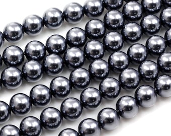 May include: A strand of dark gray pearl beads. The beads are round and have a smooth, glossy finish.