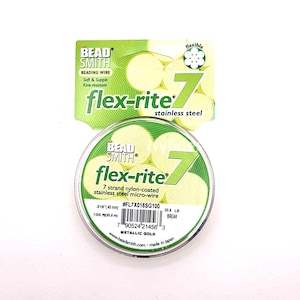 May include: A spool of The Bead Smith Flex-Rite 7 strand nylon-coated stainless steel micro-wire in metallic gold. The packaging displays the text flex-rite 7, .018 inch (0.45 mm) diameter, 100 feet (30.6 m) length, and 20.6 lb break strength.