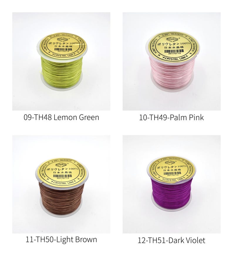 May include: Four spools of thread in various colors: lemon green, palm pink, light brown, and dark violet. Each spool has a gold-colored label with Japanese text and the brand name "CRYSTAL LINE". The thread is tightly wound on a white spool.
