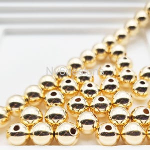 7mm 14K Gold Filled Seamless Round Beads 5pcs – 1.8mm hole Bright Yellow Gold Spacer Beads for Jewelry Making – Made in USA