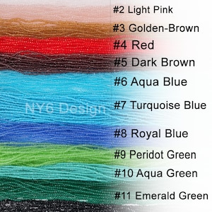 May include: Twelve rows of seed beads in different colors, including clear, light pink, golden brown, red, dark brown, aqua blue, turquoise blue, royal blue, peridot green, aqua green, emerald green, and deep black.