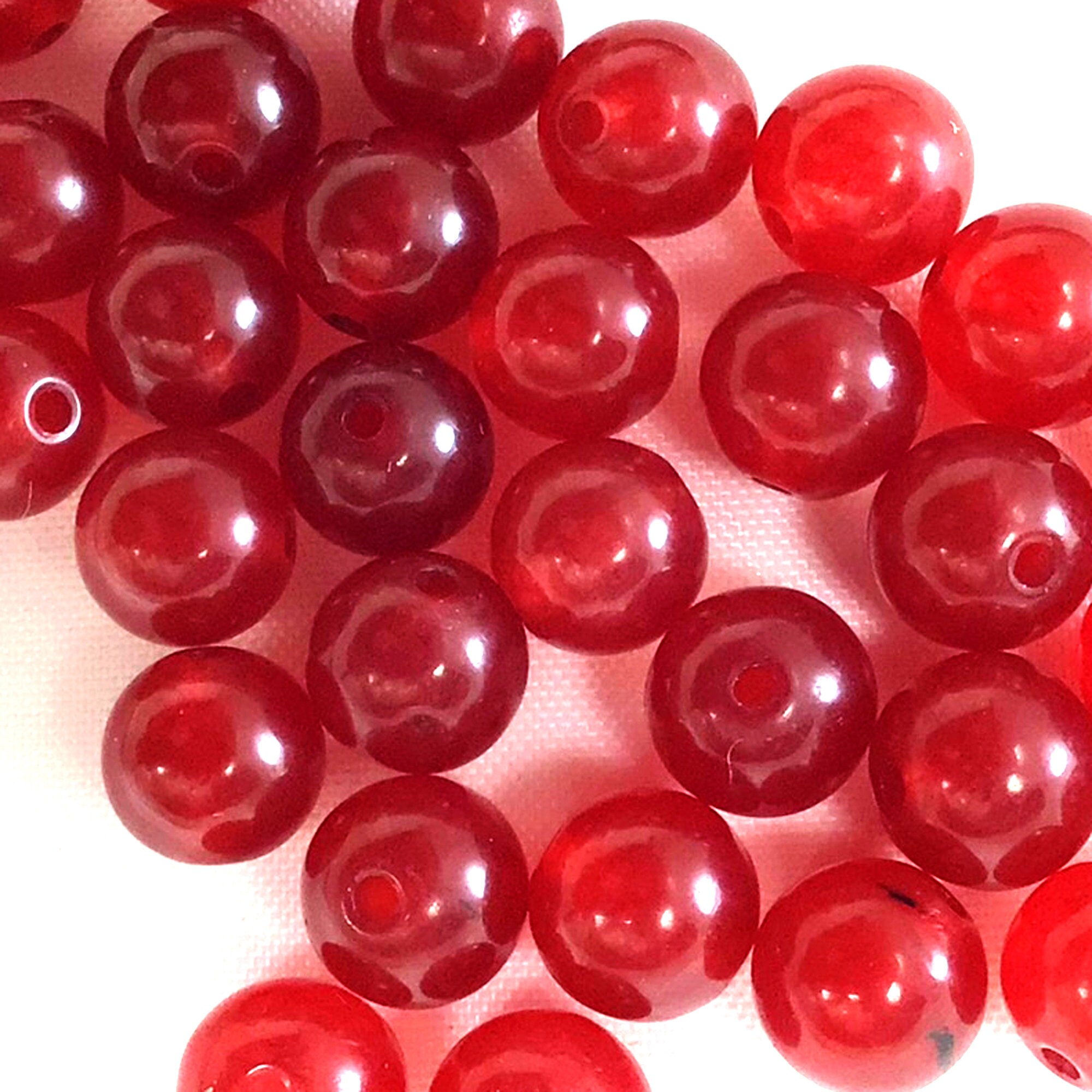 thumbnail image 2 of Natural AAA Brazilian Red Jade Faceted Round Beads - 4mm, 15 Inch Loose Strand 2 of 2