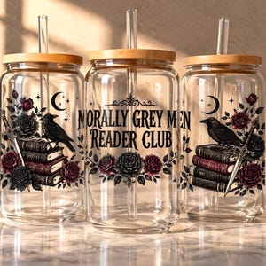 Three glass tumblers with "Morally Grey Men Reader Club" text, featuring books, roses, and a raven.
