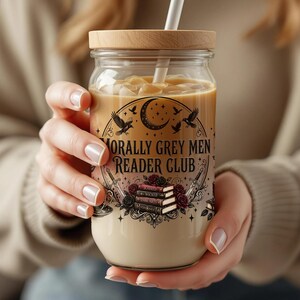 Jar with "Morally Grey Men Reader Club" text and books.