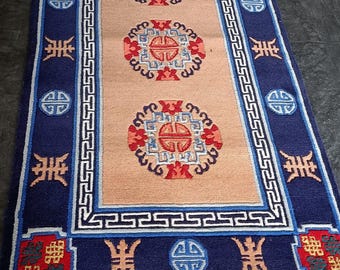 Traditional Tibetan Wool Carpet – Hand-Knotted with Lotus Motifs & Sacred Symbols