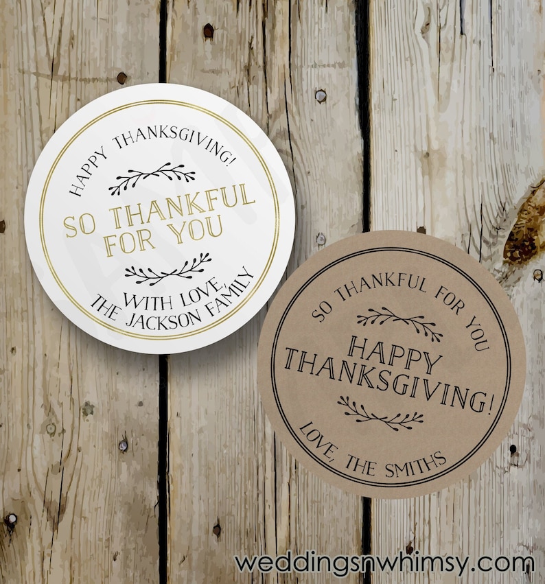 May include: Two round Thanksgiving gift tags. One is white with gold lettering and the other is brown with black lettering. Both tags feature the text "So Thankful For You" and a simple leaf design. The white tag says "Happy Thanksgiving!" and "The Jackson Family, With Love." The brown tag says "Happy Thanksgiving!" and "Love, The Smiths."