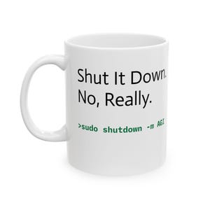 Puede incluir: Taza de cerámica blanca con el texto "Shut It Down. No, Really." en negro y "sudo shutdown -m AGI" en verde. La taza tiene un asa curva y es adecuada para bebidas frías o calientes.