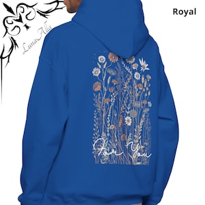 May include: Royal blue hoodie with a floral design on the back. The design features various flowers in shades of orange, white, and beige, with the words "For You" in a cursive font. The hoodie also has the text "Royal" on the upper right.