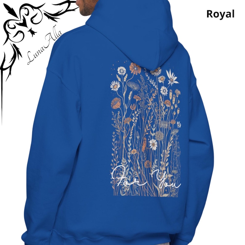 May include: Royal blue hoodie with a floral design on the back. The design features various flowers in shades of orange, white, and beige, with the words "For You" in a cursive font. The hoodie also has the text "Royal" on the upper right.