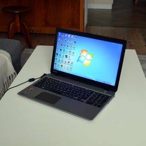 vintage laptop TOSHIBA SATELLITE M50D-A-10D with Windows 7 and retro games