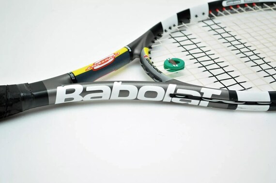 Raqueta de tenis BABOLAT CONTEST Si Sidewoofer con empuñadura