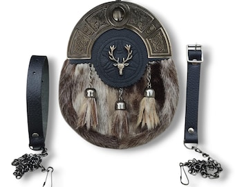 May include: A traditional Scottish sporran with a fur body in shades of brown and grey. It features a decorative metal cantle with Celtic knotwork, a leather flap with a stag emblem, and two leather straps with chains.