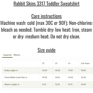 May include: Rabbit Skins 3317 toddler sweatshirt care instructions and size guide chart. Includes machine wash cold 30C or 90F, non-chlorine bleach, tumble dry low, iron medium heat, no dry clean. Table lists body length, chest width, and sleeve length in inches.