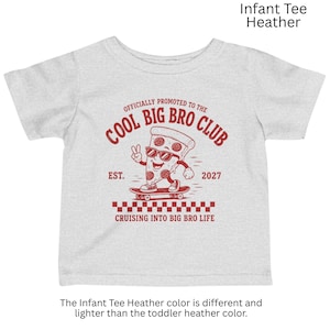 May include: A light heather gray infant t-shirt featuring a red graphic of a pizza slice on a skateboard. The text reads: OFFICIALLY PROMOTED TO THE COOL BIG BRO CLUB, EST. 2027, and CRUISING INTO BIG BRO LIFE, with a checkered pattern at the bottom.
