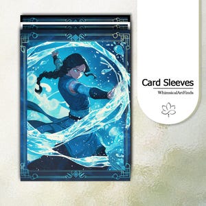 May include: A stack of rectangular card sleeves featuring a dark-haired character in a blue outfit surrounded by swirling water elements. The design includes a decorative border and the text Card Sleeves WhimsicalArtFinds with a lotus flower icon.