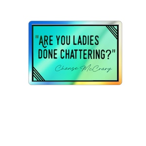 May include: A rectangular sticker with a holographic background, framed in black and silver. The sticker features the text "ARE YOU LADIES DONE CHATTERING?" and the name "Chance McCrary" in a script font.